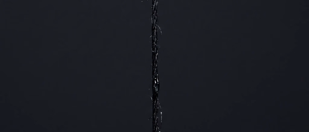 Black fiber with water droplet