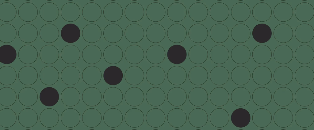 Grid of circles with scattered dark circles