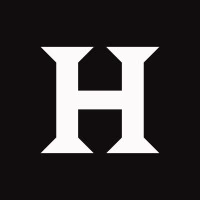 White "H" on black background.