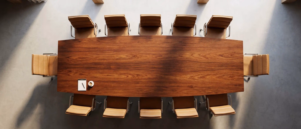 Conference table with chairs and notebook