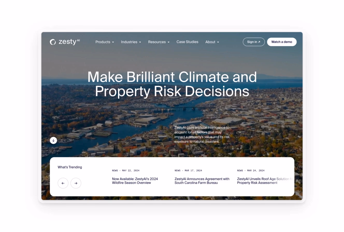 Homepage of Zesty AI featuring an aerial view of a city, promoting AI solutions for climate and property risk decisions.