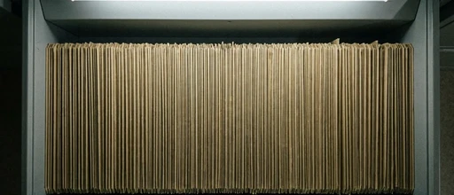 File cabinet drawer full of manila folders.