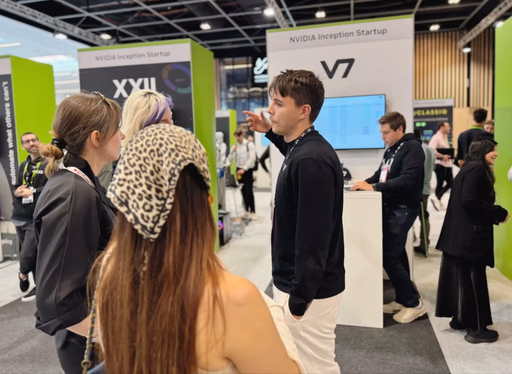 People at a tech conference with NVIDIA branding