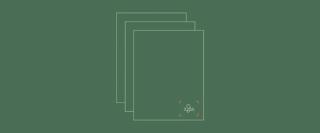 Three stacked documents with a signature and red frame