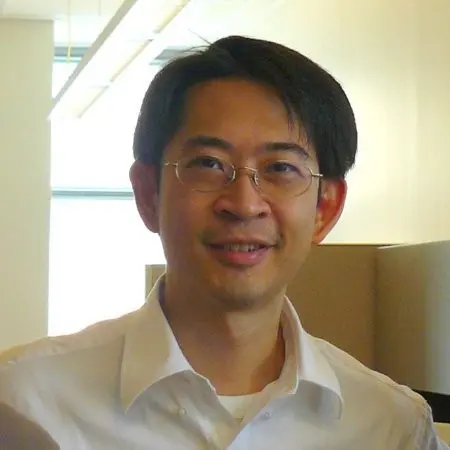 Man with glasses and black hair.