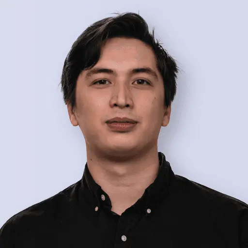 Man with dark hair and black shirt